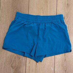 Athleta weekender run Blue Athletic Shorts size M